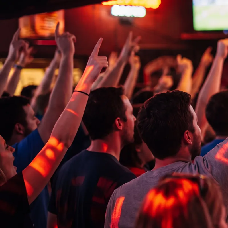 Fans celebrating in front of the big screens